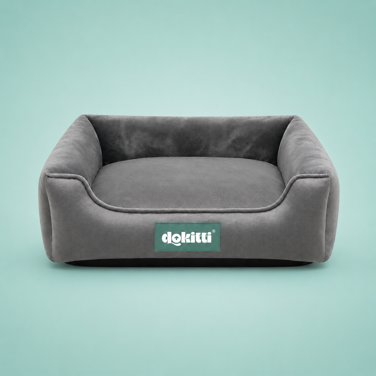Gray pet bed with a green 'dokittii' logo on a light blue background