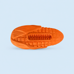 Orange shoe sole with tread pattern on a light blue background