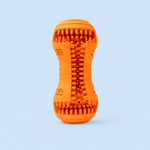 Orange textured dog toy on a light blue background