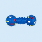 Blue dog toy with paw prints and bones on a light blue background