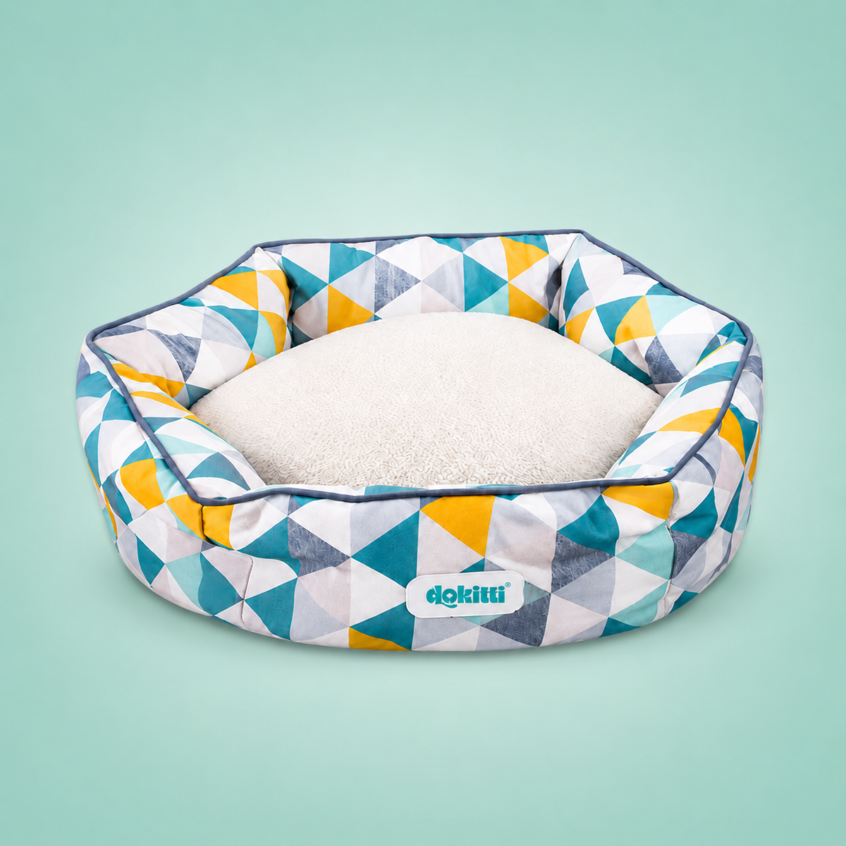 Hexagonal pet bed with geometric pattern on a light green background
