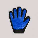 Blue grooming glove with black accents on a light gray background