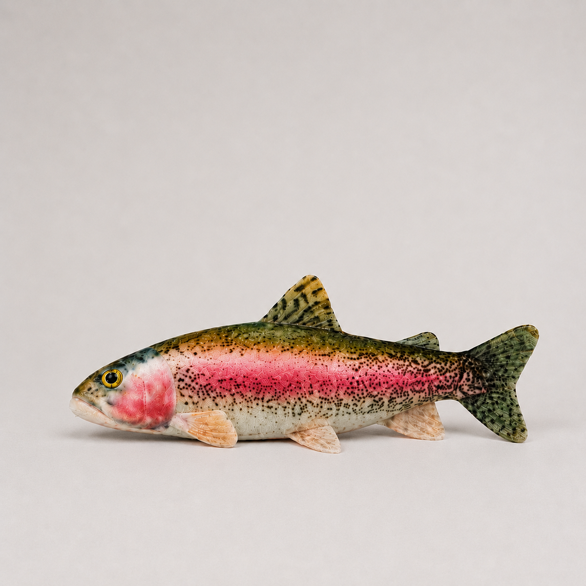 Model of a rainbow trout on a light gray background